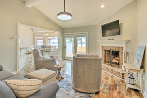 TV, fireplace - Gilbert Lakefront Retreat w/ Private Dock! (Gilbert)