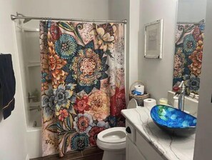 Combined shower/tub
