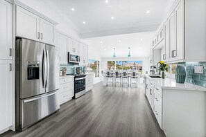 Fridge, microwave, oven, stovetop -  Luxury WaterFront Home, Putting Green, Bocce, Kayaks SUP's Bikes Pool/PPong Tbl (Marco Island)