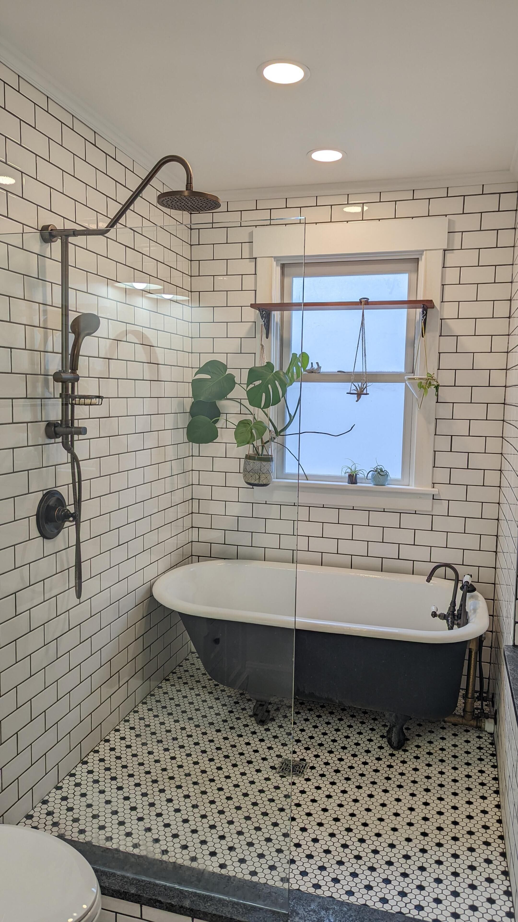 Bathtub, hair dryer, towels, soap