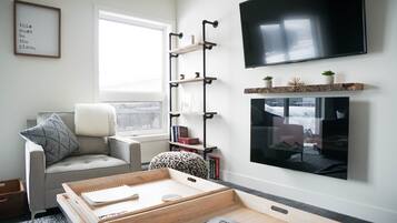 The Revy Den | Living area | 40-inch Smart TV with digital channels, TV, fireplace