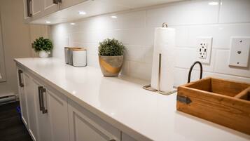 The Revy Den | Private kitchen | Full-sized fridge, microwave, oven, stovetop