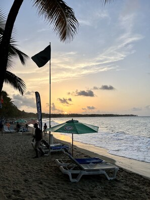 On the beach, sun loungers, beach towels