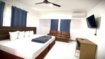 Deluxe Room, 2 Queen Beds | Desk, laptop workspace, free WiFi, bed sheets
