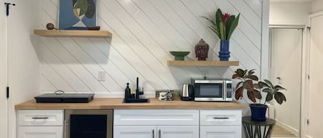 Fridge, microwave, stovetop, cookware/dishes/utensils