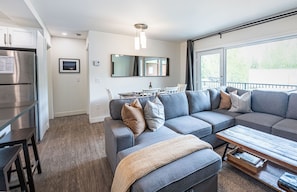 The RendezView | Living area | 40-inch Smart TV with digital channels, TV, fireplace - The RendezView by Revelstoke Vacations (Revelstoke)
