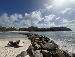 On the beach, sun loungers, beach towels