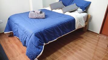 Premium bedding, down duvets, minibar, laptop workspace