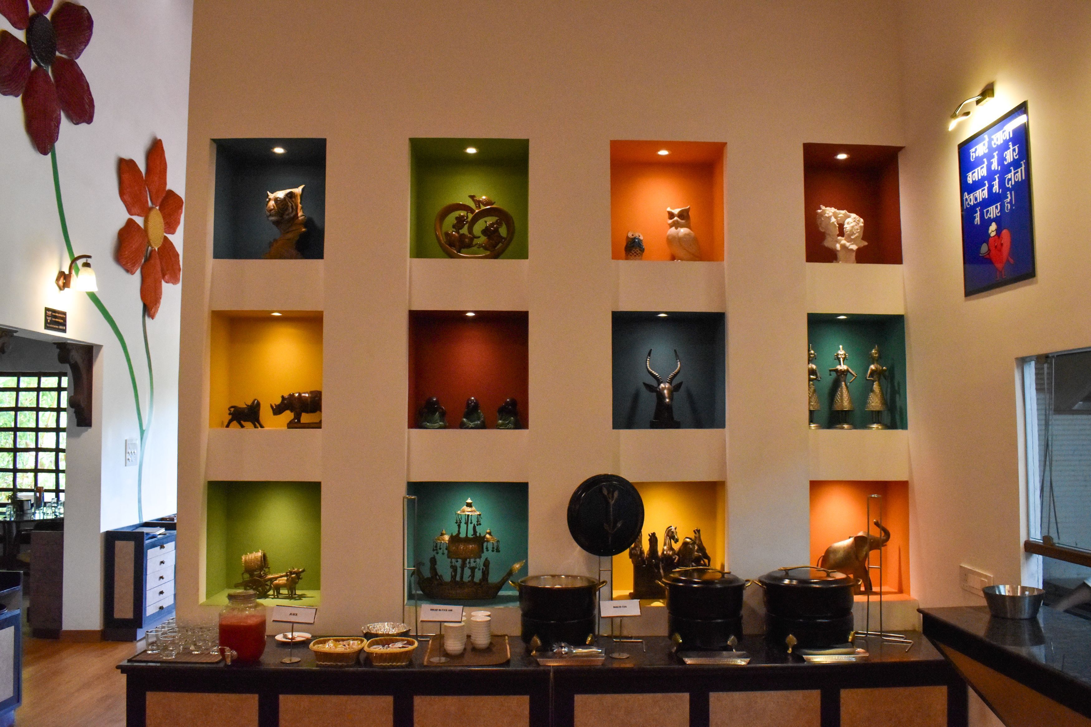 A display of various decorative items in a museum or gallery setting.