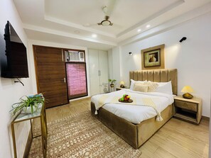 Apartemen, 3 kamar tidur | 3 kamar tidur, meja kerja, setrika/meja setrika, dan Wi-Fi gratis