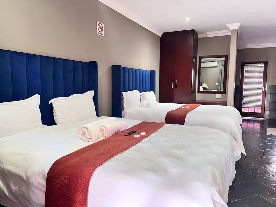 Minibar, laptop workspace, bed sheets