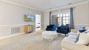 Signature Condo, 2 Bedrooms, Patio, Pool View | Living room | 55-inch flat-screen TV with cable channels, TV