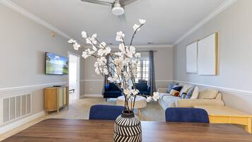 Signature Condo, 2 Bedrooms, Patio, Pool View | Living room | 55-inch flat-screen TV with cable channels, TV