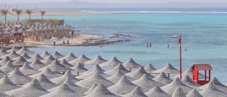 Private beach, white sand, free beach cabanas, sun loungers