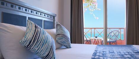 Egyptian cotton sheets, premium bedding, minibar, in-room safe