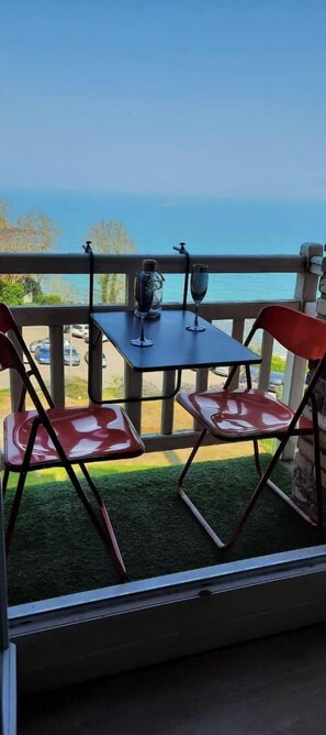 Enjoy a refreshing drink on the balcony overlooking the water.