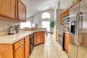 Villa, 4 Bedrooms | Private kitchen | Cookware/dishes/utensils, dining tables - Maria's Beautiful Southern Dunes Home 4 Bedroom Villa by RedAwning (Haines City)