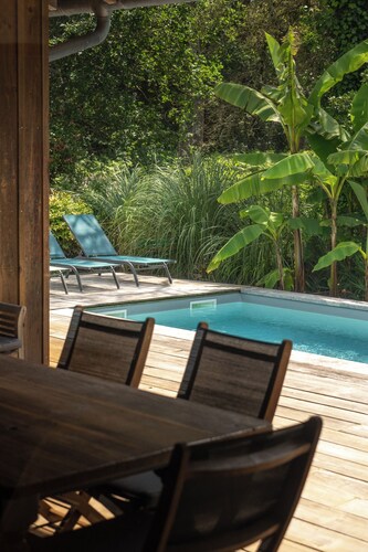 Wooden house with heated pool, fiber internet and view into forest