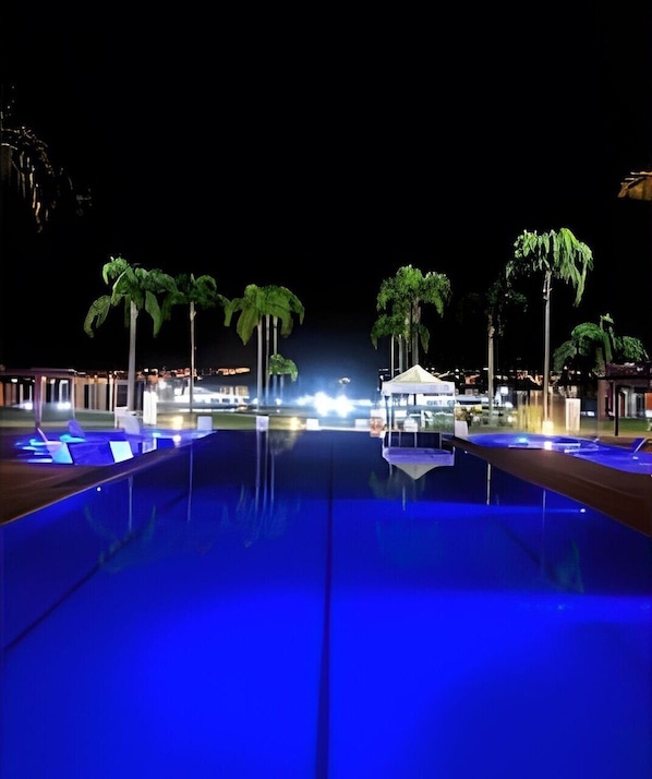 Apartment | Pool | 3 outdoor pools, open 7:00 AM to 10:00 PM, pool loungers