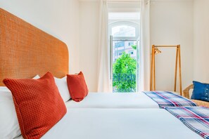 Appartement, 3 slaapkamers | 3 slaapkamers, individueel gedecoreerd, reisbedje, gratis wifi