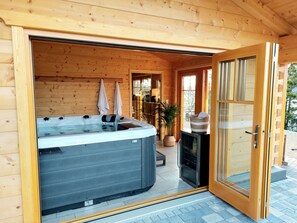 Terrace/patio - Vacation home with garden, playground, whirlpool, wood-fired sauna, pet-friendly (Plütscheid)