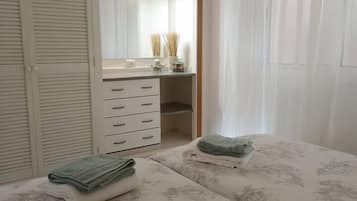 Iron/ironing board, travel crib, WiFi, bed sheets