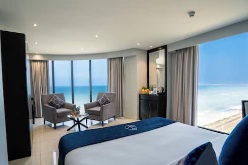 Signature kamer, 1 slaapkamer | Uitzicht op strand/zee