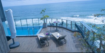 Outdoor pool, open 7:00 AM to 4:00 PM, pool umbrellas, sun loungers