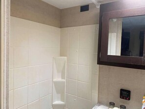 Bathtub, hair dryer, towels