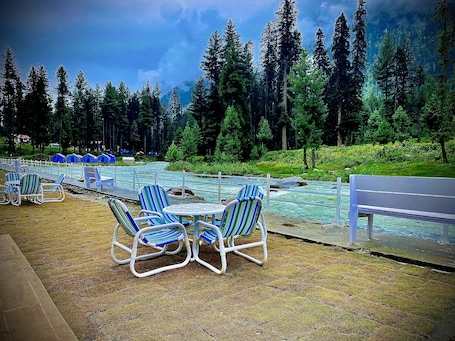 Outdoor dining. Luxury Resort in Kumrat. 5 min from the waterfall.