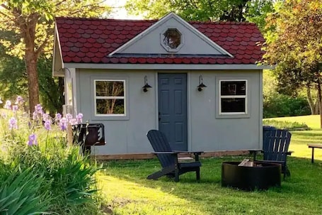 Property grounds. The Camper’s Cabin W/ Bunk Bed
