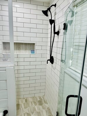 Combined shower/tub, hair dryer, towels, soap
