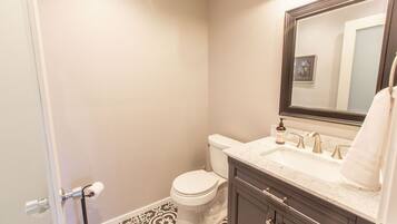 Combined shower/tub, hair dryer, towels, soap