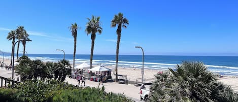 On the beach, sun-loungers, beach towels