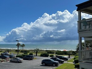 Enjoy ocean views from the balcony with a railing.