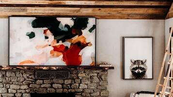 TV, fireplace, books, stereo