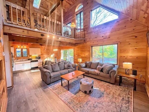 Smart TV, fireplace, foosball, books