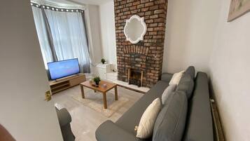 Standard House | Living area | 43-inch Smart TV with satellite channels, TV, Netflix