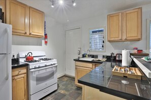 Microwave, stovetop, dishwasher, coffee/tea maker