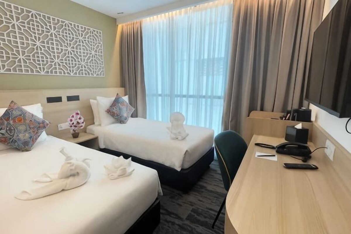 Memory foam-senger, minibar, safe på rommet og strykejern/-brett