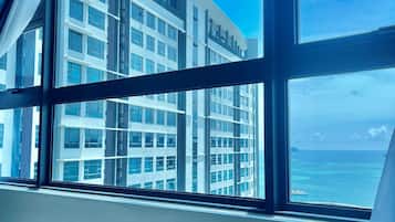 Comfort Suite | Living area | 35-inch LED TV with digital channels, TV, streaming services