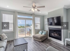 Smart TV, fireplace, books