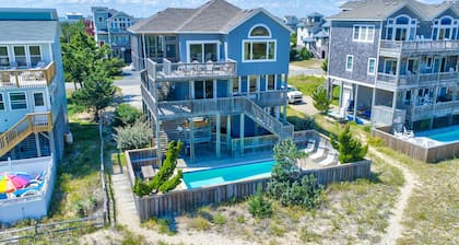 Beachfront getaway with ocean views, private pool, hot tub, bar, deck & foosball