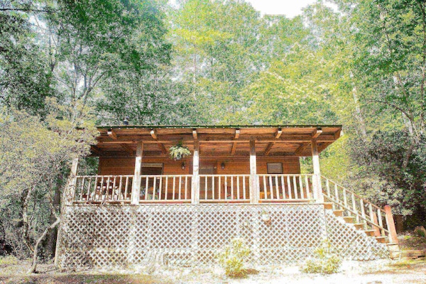 Front of the cabin with the covered porch