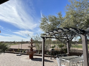 Outdoor dining - A golf course single family home. (Maricopa)