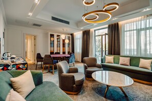 Junior Studio Suite, Non Smoking, City View | Living area | 160-cm Smart TV with satellite channels, TV, pay movies - IVY GARDEN HOTEL BAKU (Baku)