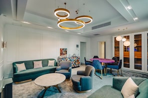 Junior Studio Suite, Non Smoking, City View | Living area | 160-cm Smart TV with satellite channels, TV, pay movies