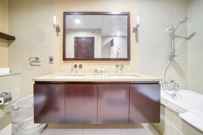 Bathtub, hair dryer, towels