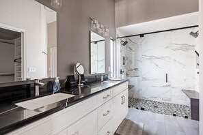 Combined shower/tub, hair dryer, towels, toilet paper