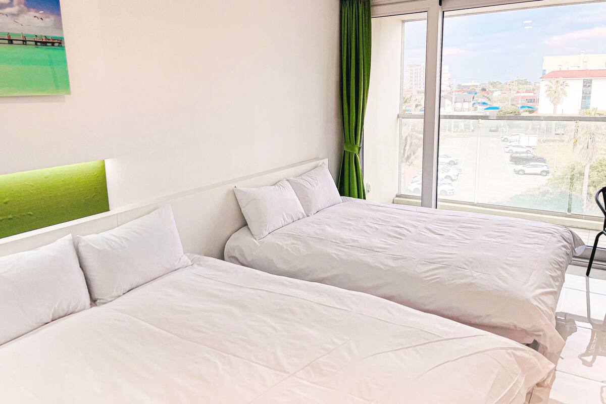 FamilieTwin kamer (Provided a cup of Americano per stay) | Gratis wifi, beddengoed